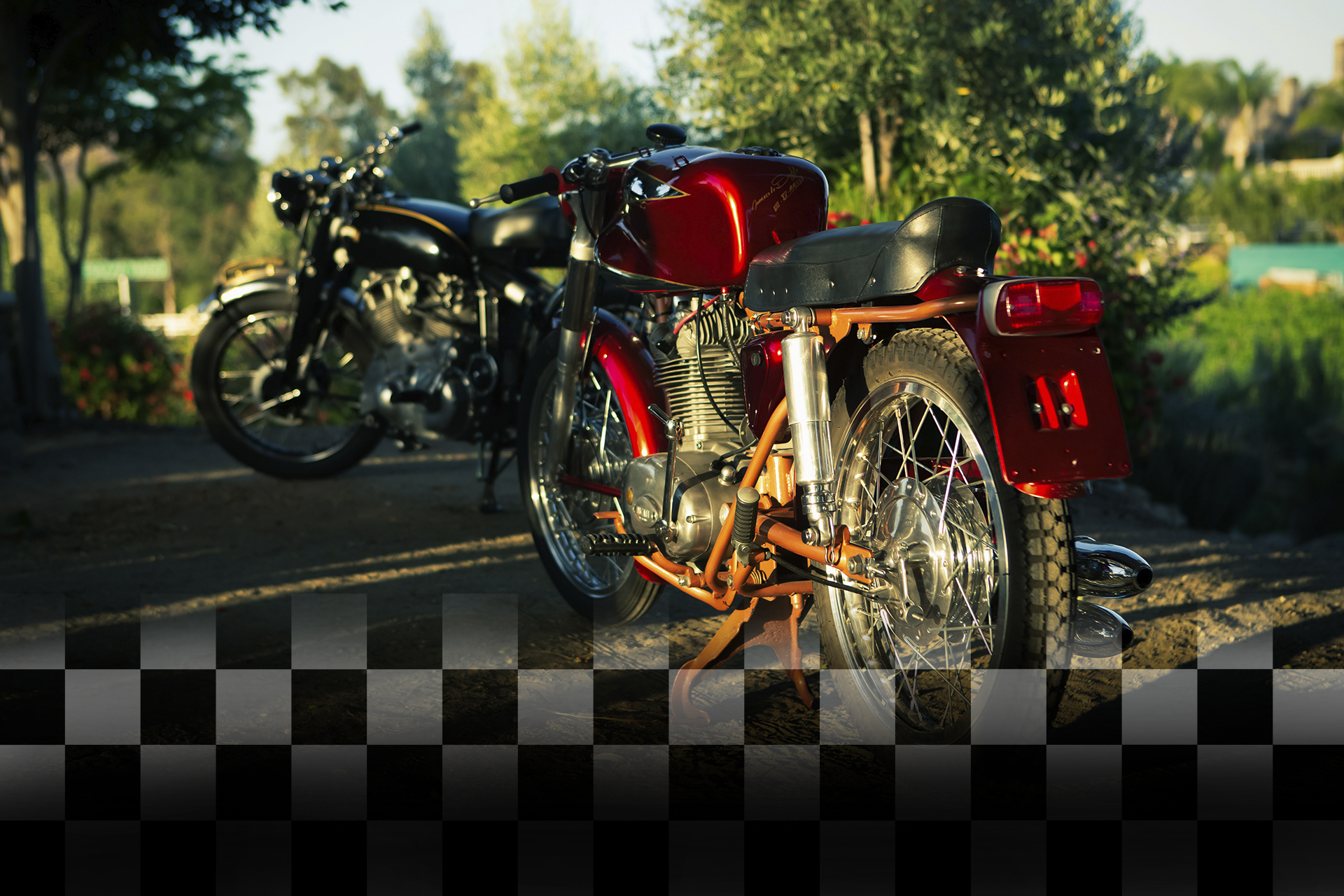 vintage Ducati and Vincent motorcycles on a winery vineyard hilltop